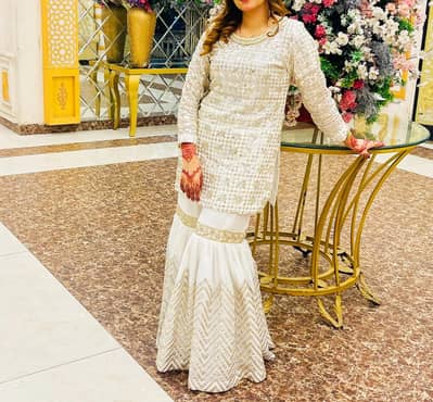 fancy party wear dress branded by Atif boutique