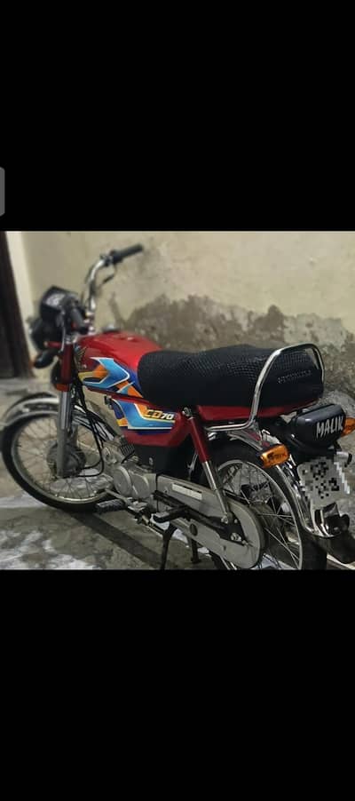 Honda CD 70 red