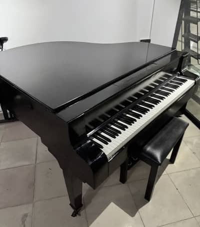 Digital Grand Piano available with free infinity table