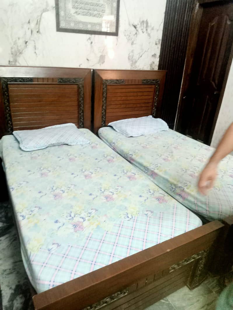 2 single bed without mattress 3