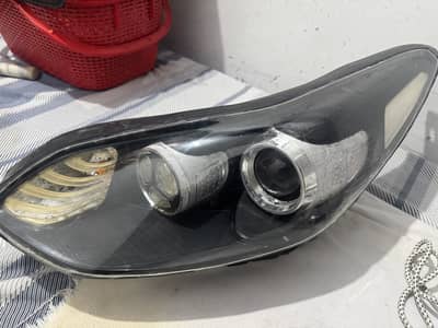 Kia Sportage Alpha headlight Left