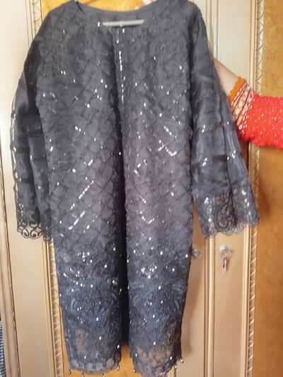 Black Imbrodied suit