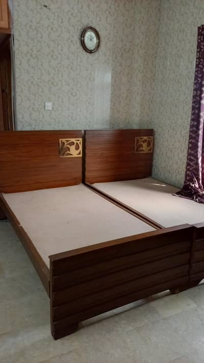 Two single beds for sale
