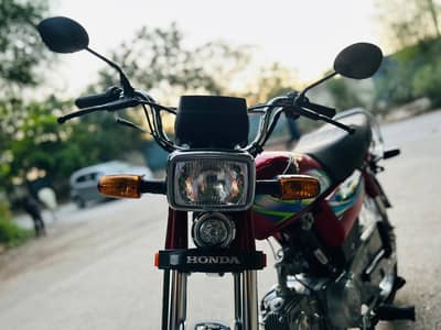 all okay bike red colour bike 2024 model Islamabad number