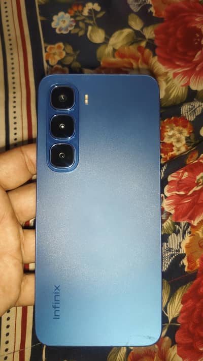 i am selling my infinix hot 60i in 10/10 condition  6+6gb 128 gb