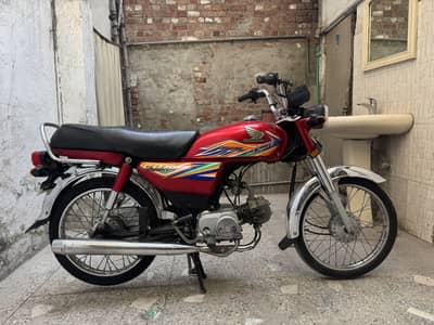 Honda cd 70 red colour