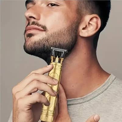 Golden rechargeable men's hair trimmer with 4 combs