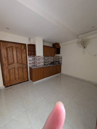 1BED unfurnished apartment available monthly for rent in ISLAMABAD E11 2