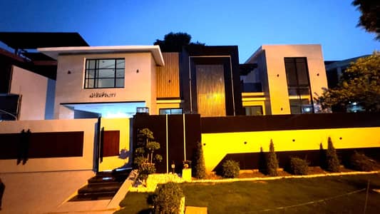 One Kanal Brand New Luxury Ultra-Modern Design Most Beautiful Bungalow 2 Servant Quarter In Basement For Sale At Prime Location Of DHA Lahore Near To Park Masjid & Commercial Market.