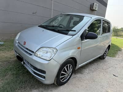 Daihatsu Mira 2004