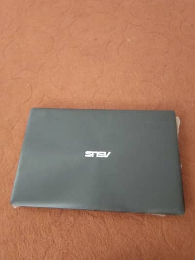 Asus laptop with charger.