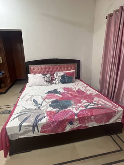 Black wooden bed