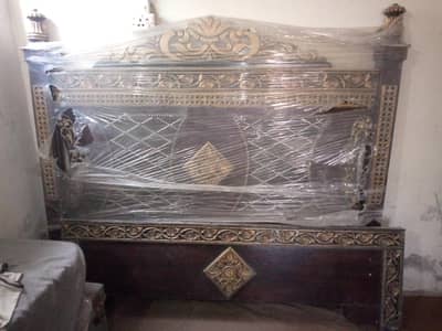Bed and side table