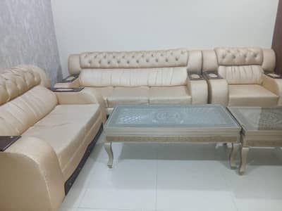 Slightly used sofa set 3,2 1 seater and with 3 table set