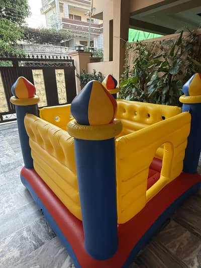 Kids Inflatable Bouncy Castle Play Area – Yellow, Red & Blue.