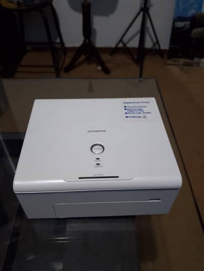 Olympus digital photo printer phone number 03224593889