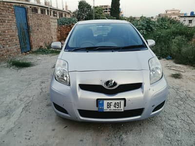 Toyota Vitz 2008 imported 14 good condition 1000cc brown dashboard wal