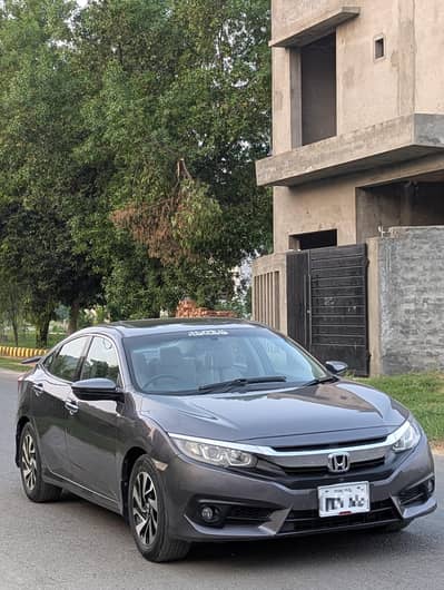 Honda Civic Oriel ug full option 2017