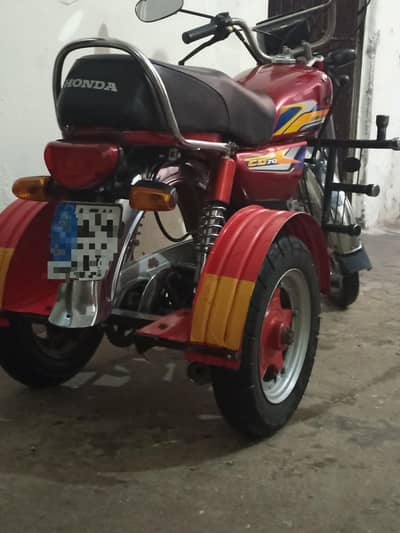3 wheeler bike for disable person