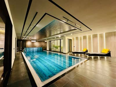 Luxury 10 Marla House | Semi-Furnished pool| Full Basement | Park Facing
