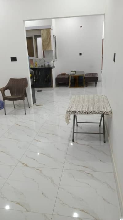 1050 sqft flat 2 bed attach bath D. D with powder washroom with car parking back side Hassan zai koyla karhai Pechs block 2