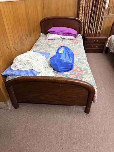 2 single beds along with mattresses