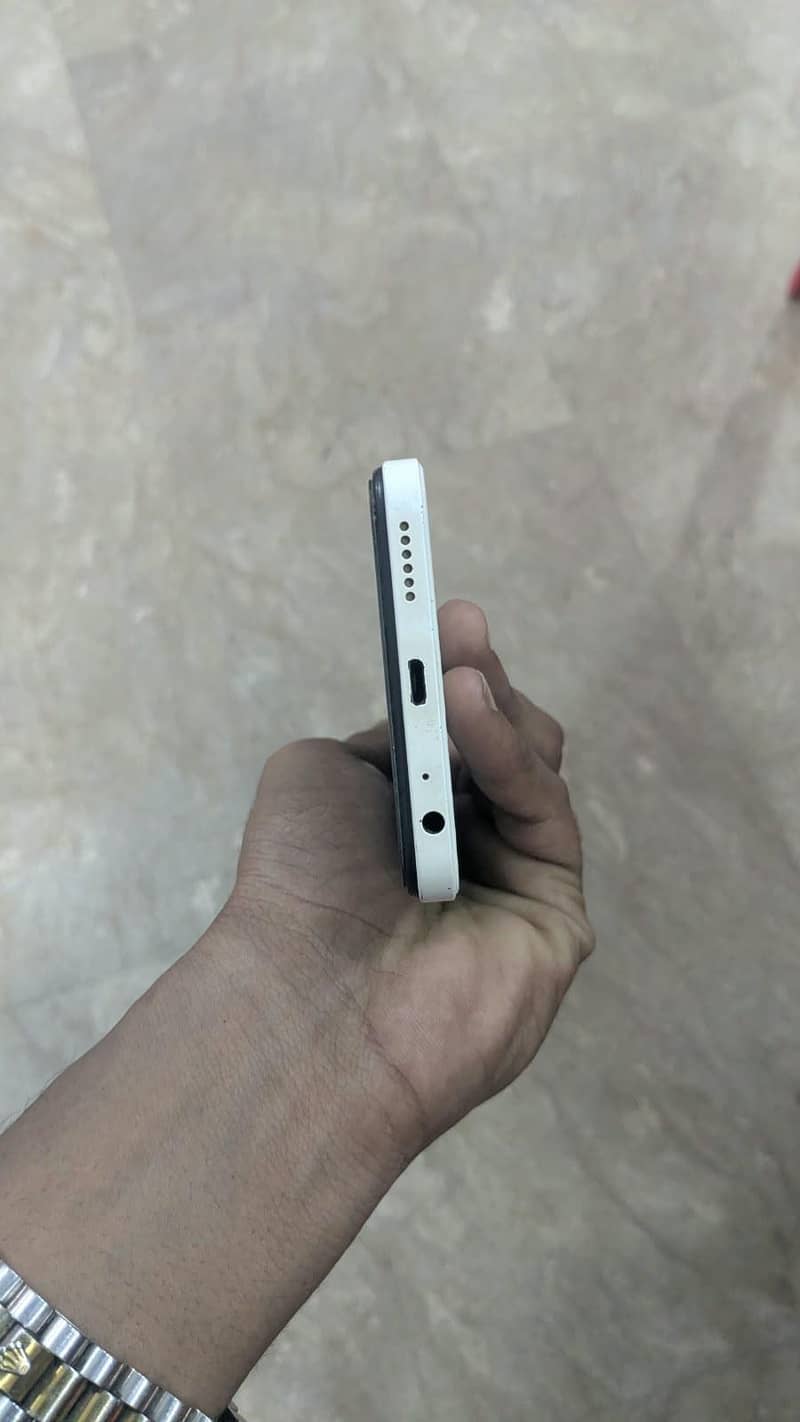 Infinix Smart 7 4