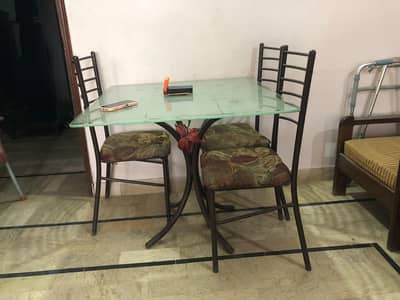 Dining table and Sofa cumbed