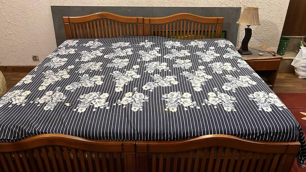 excellent quality solid wood 2 single beds 1