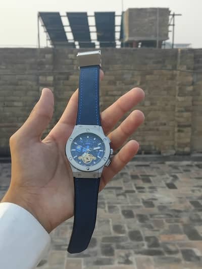 Hublot with blue straps and white dial