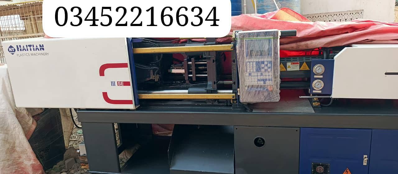 injection moulding machine 12