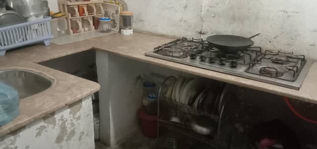kitchen marble with stove and sink