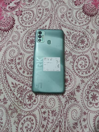 Tecno Spark 7.    or spark 6go dono 64gb