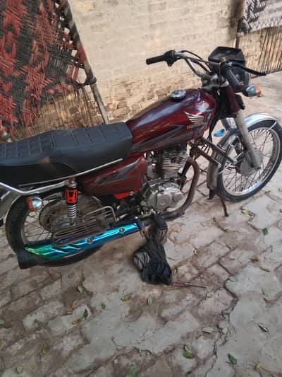 honda 125cc model 2016 number 18 my laga ha koi kam ni honay wala good