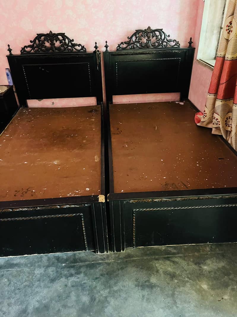2 single bed and showcase 0