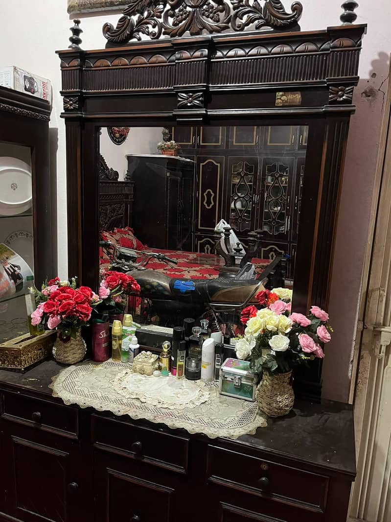 2 single bed and showcase 1