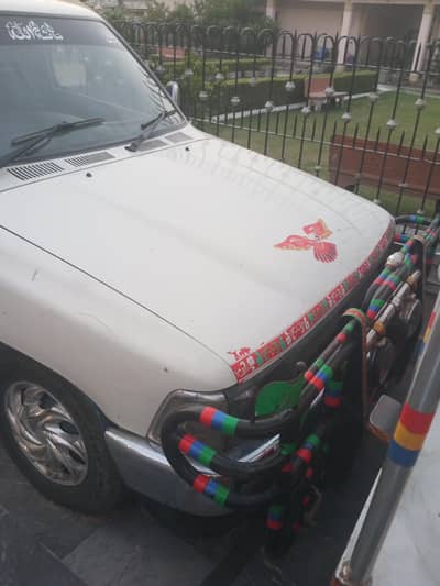 Nissan cheeta single kabin with 2000 litter milk tank