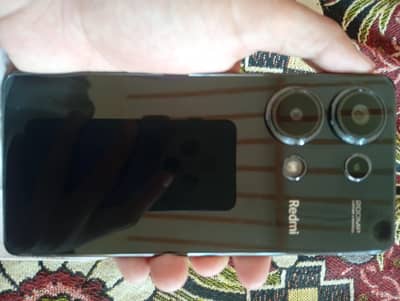 Xiaomi Redmi Note 13 Pro with box and 67 W fast charger