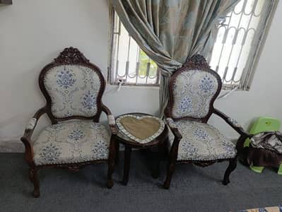 2 bedroom chairs with table