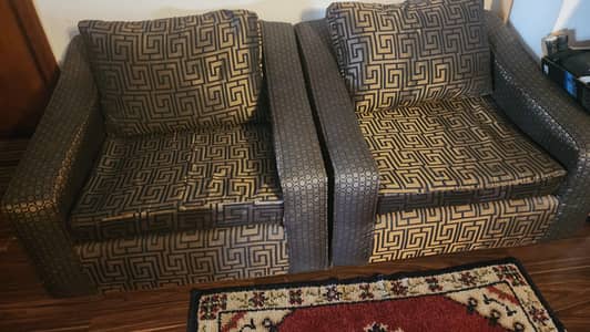 2 single seater sofas new poshish just like brand new.