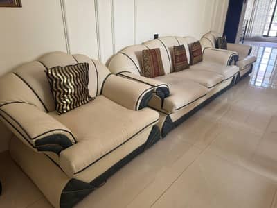 Off white leather 5 seated sofa