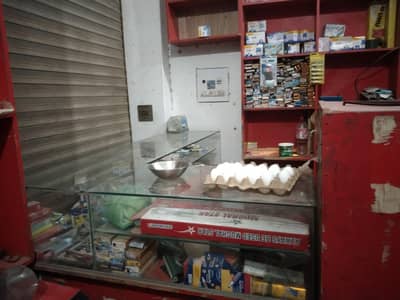Shop Counter + Red Wooden Racks for Sale