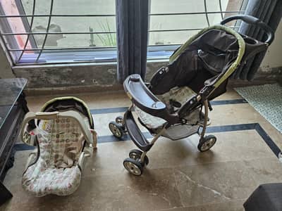 Graco baby stroller (pram) with car seat. .