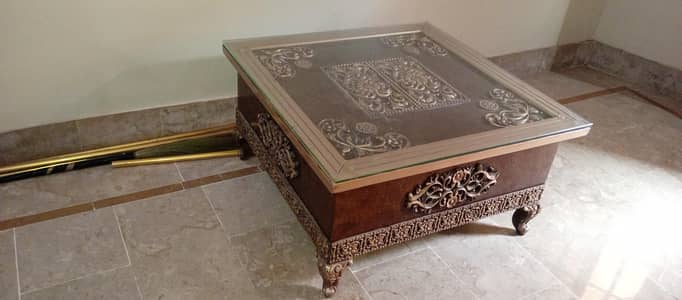 square wooden center table with a glass top  03172471819