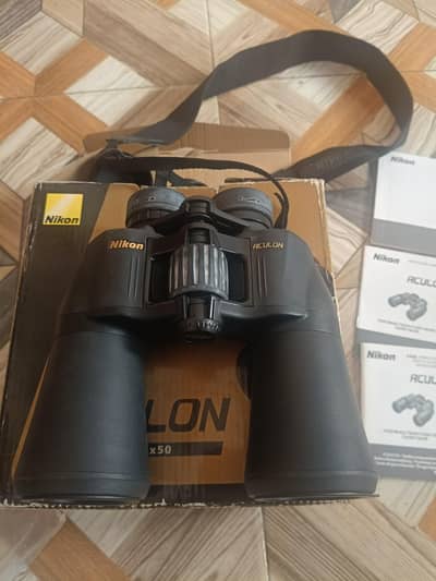 Nikon‘s black 12×50 Aculon A211 Binoculars, 0304-0202596