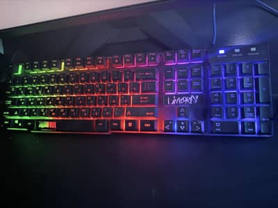 Full size wired RGB Gaming keyboard with keycaps and custom accents