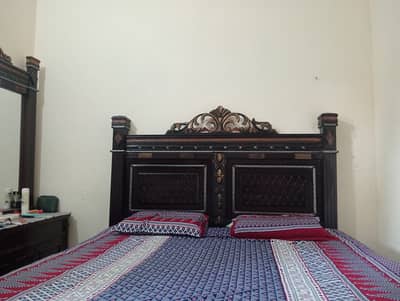 Used double bed with side tables and dressing table