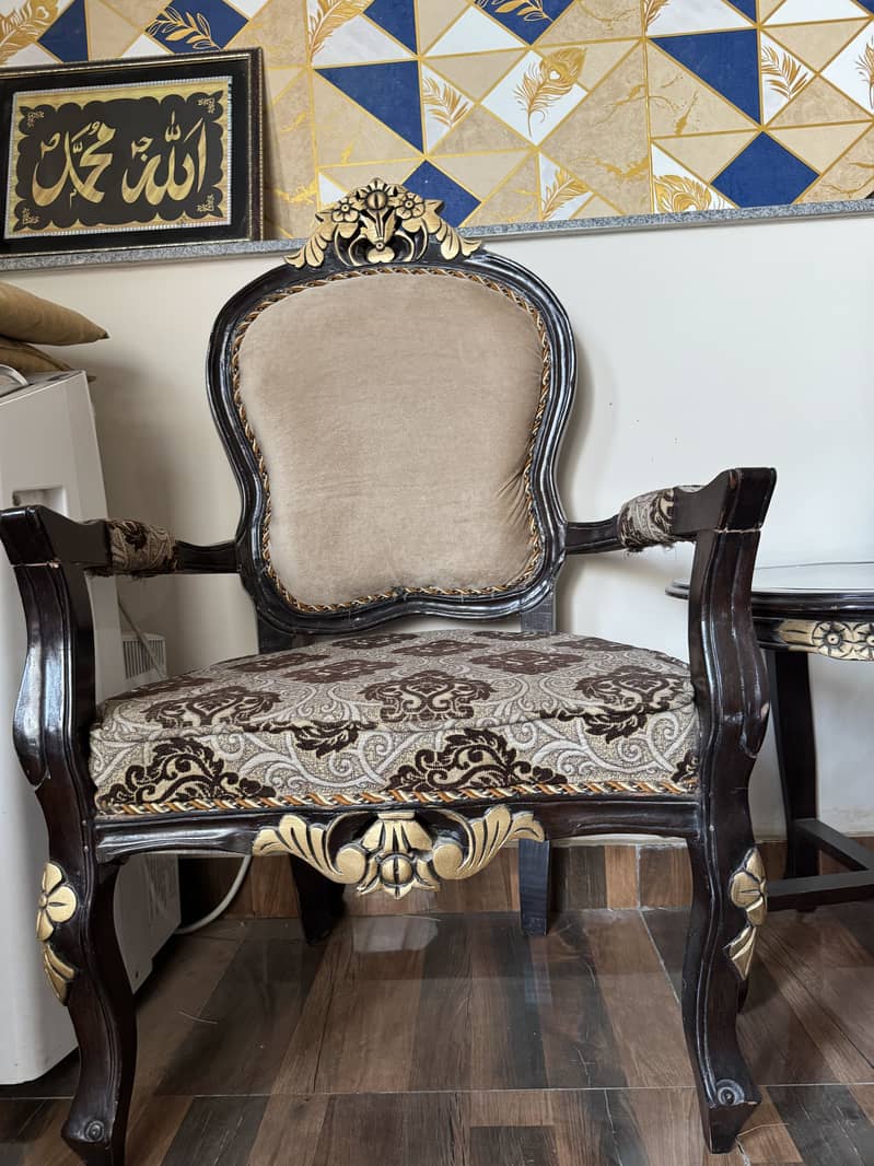 2 chairs and table 0
