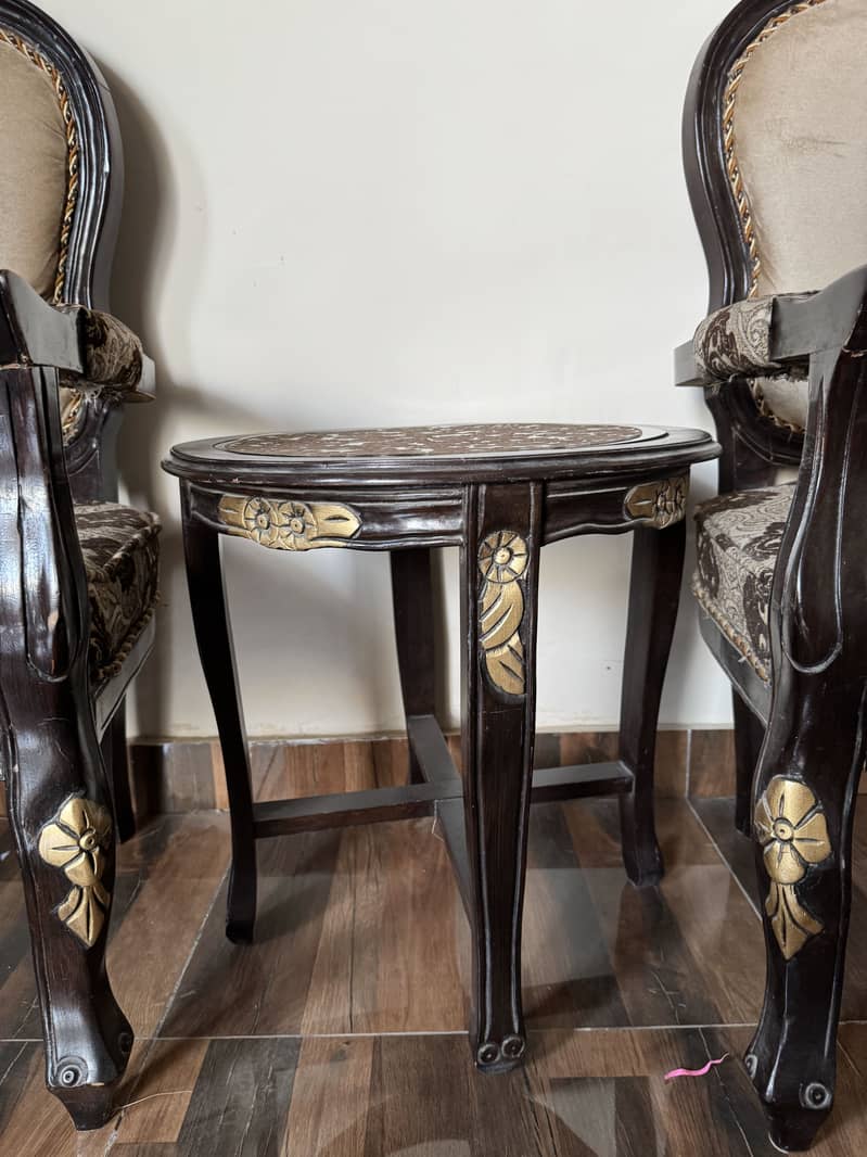 2 chairs and table 2