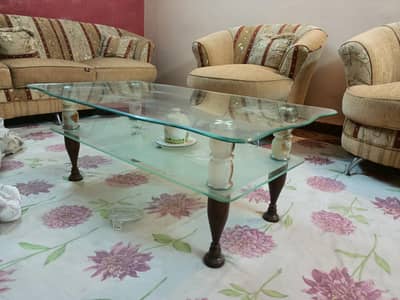 7 Seater sofa set with center glass table.